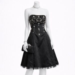 Morgan and co Elegant Black Strapless Dress with Star Embellishments
